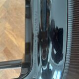 "Papyrus" black armchairs designed by Ronan and Erwan Bouroullec.