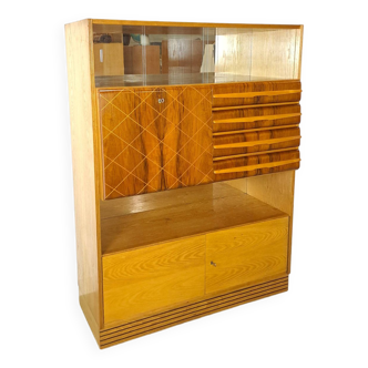 Veneer bar cabinet with round shapes and mirrored wall, display cabinet