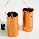 Two 50s tube pendant lamps consisting of two screwed-together copper bowls
