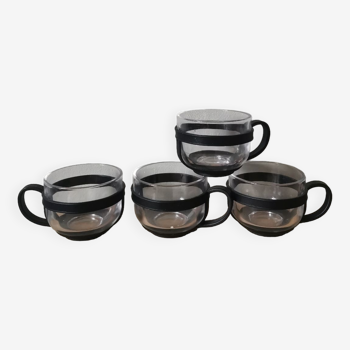 Set of 4 glass cups and plastic support