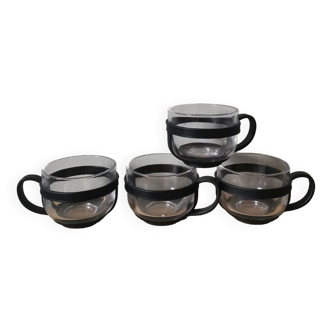 Set of 4 glass cups and plastic support