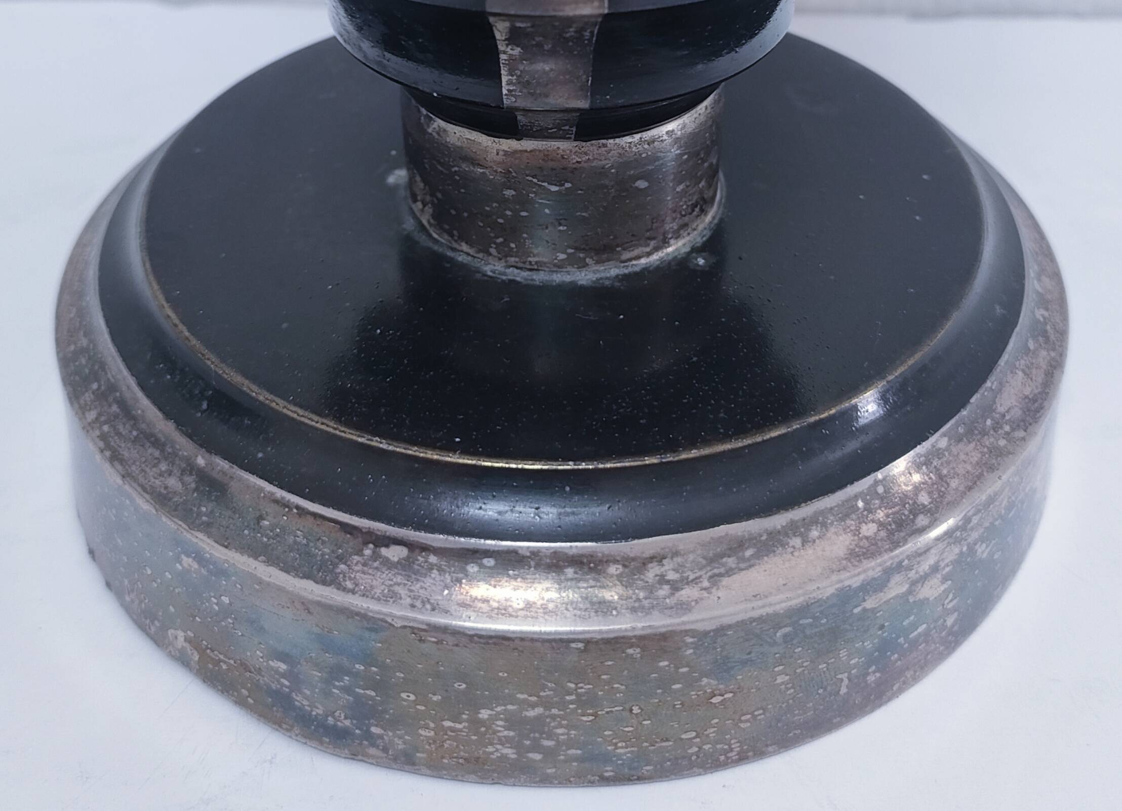 Art Deco metal lamp base with black and silver patina