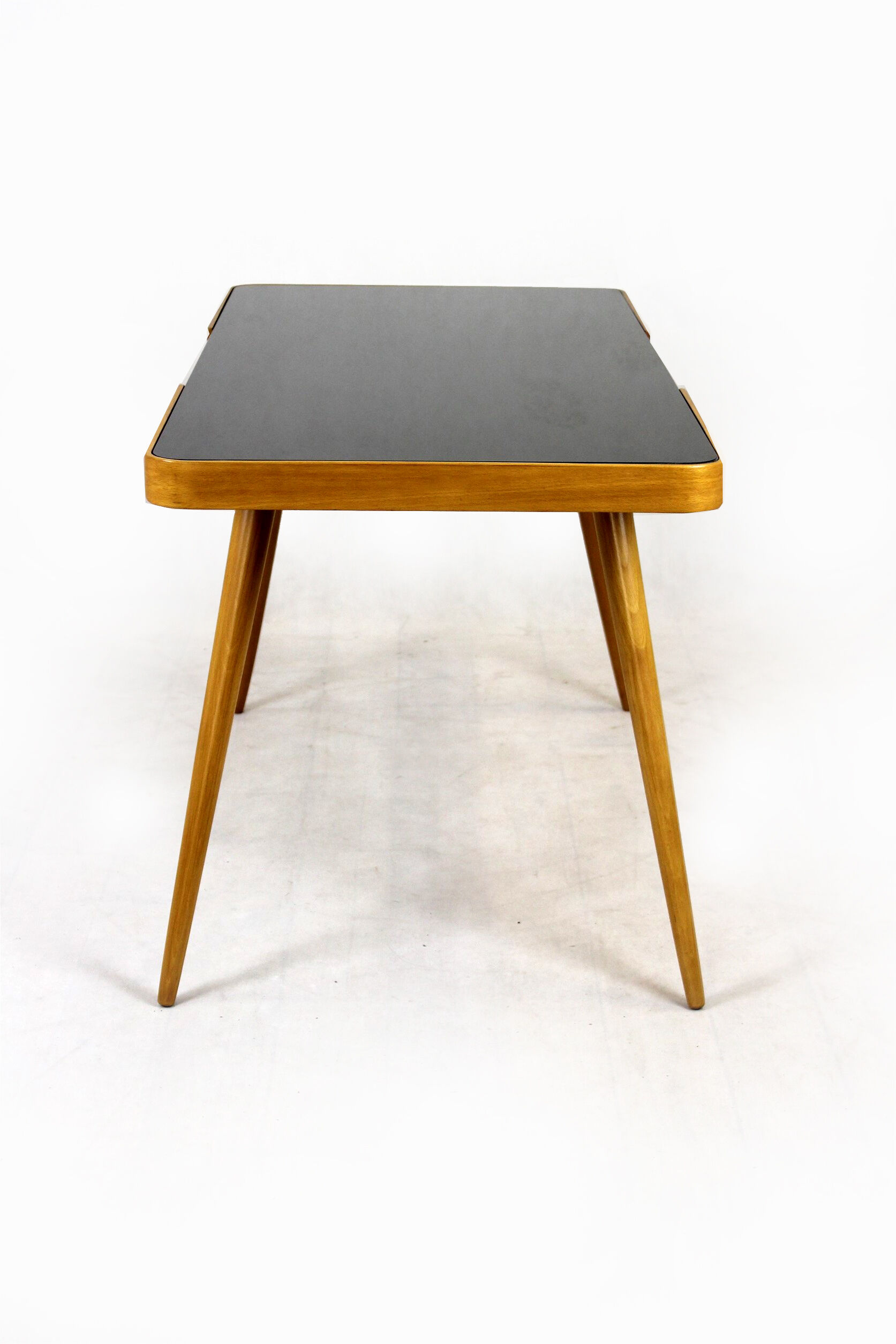 Coffee Table with Black Glass Top by Jiří Jiroutek for Cesky Nabytek, 1960s