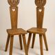 Pair of antique Catalan chairs with sun face motifs, Cerdagne