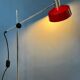 Adjustable red floor lamp in the style of Hoogervorst.