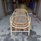 Shell armchair in rattan and bamboo - 1970s