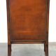 Fauteuil classique en peau de mouton avec sculptures en bois