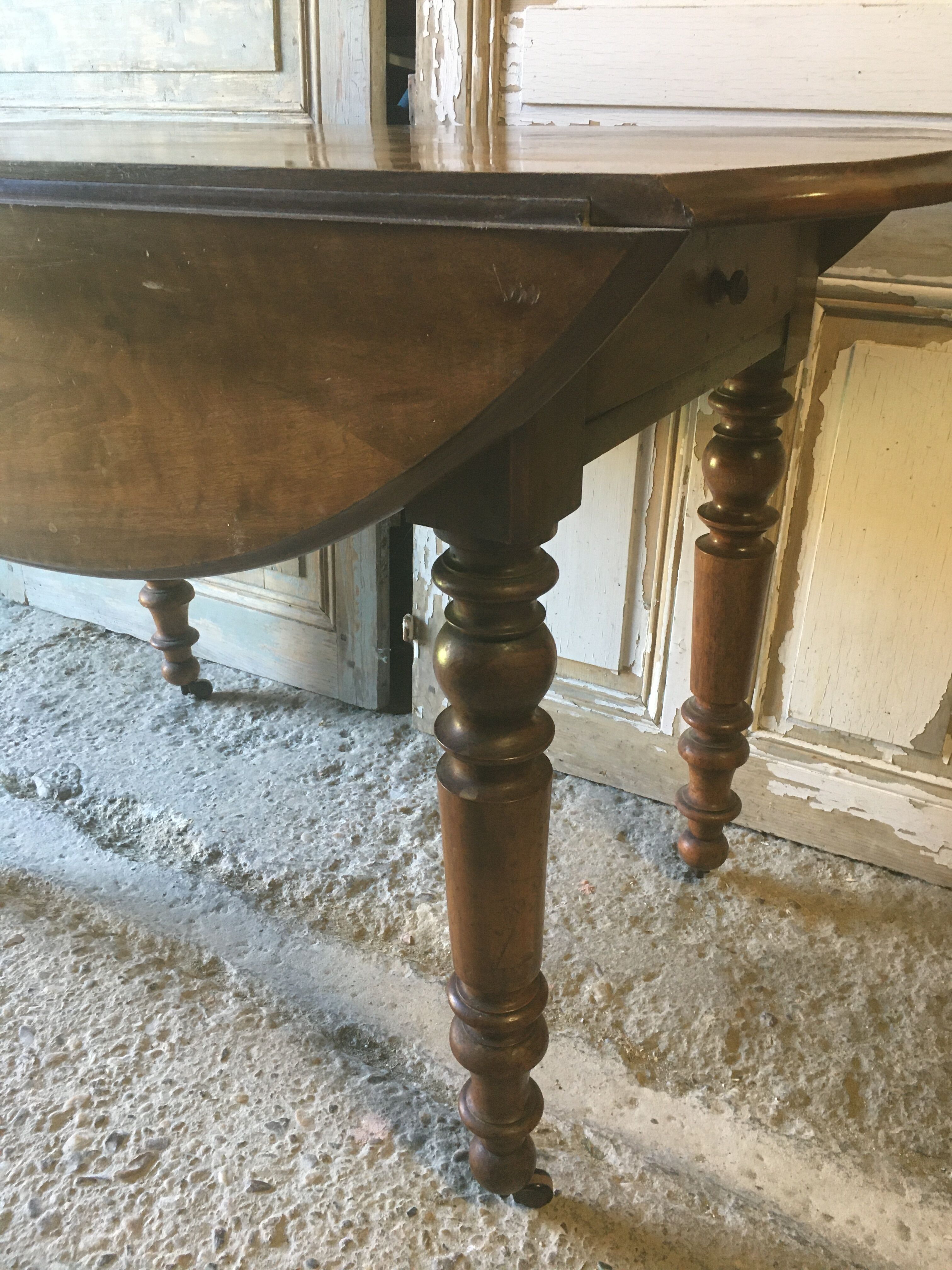 Walnut shutter table with drawer on wheels