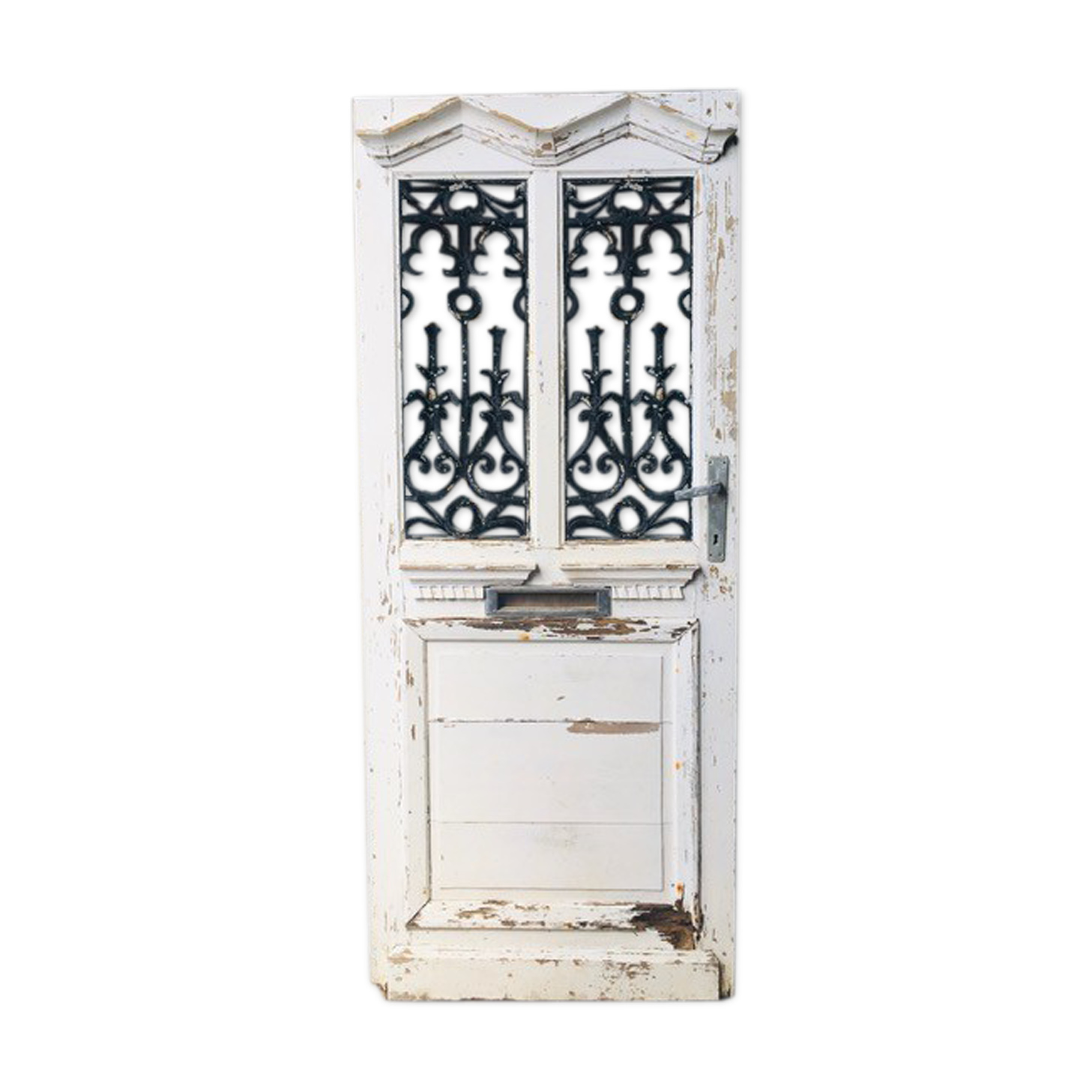 Old door with wrought iron grille