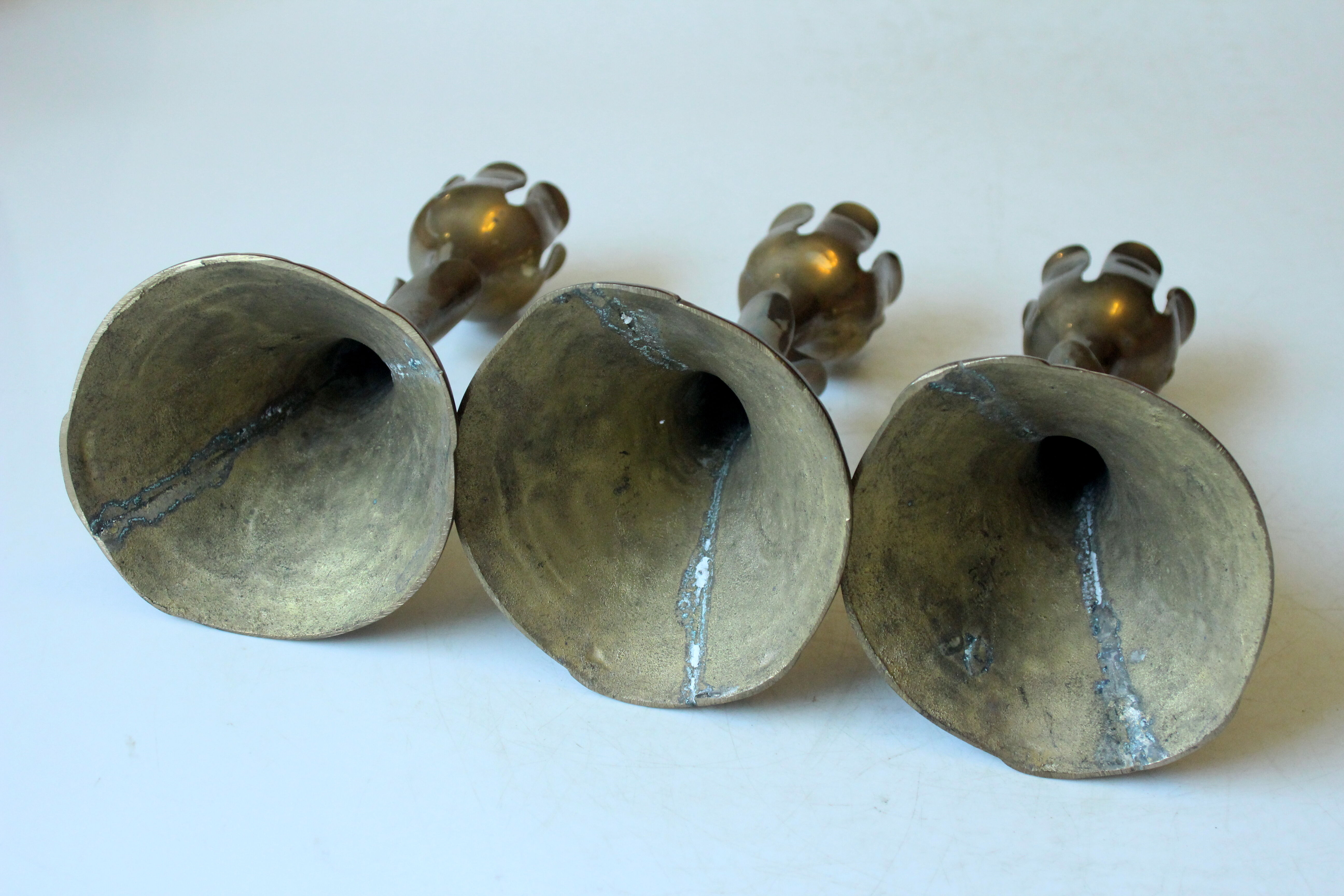 3 beautifull solid brass candle holders with floral motif, vintage from the 1960s