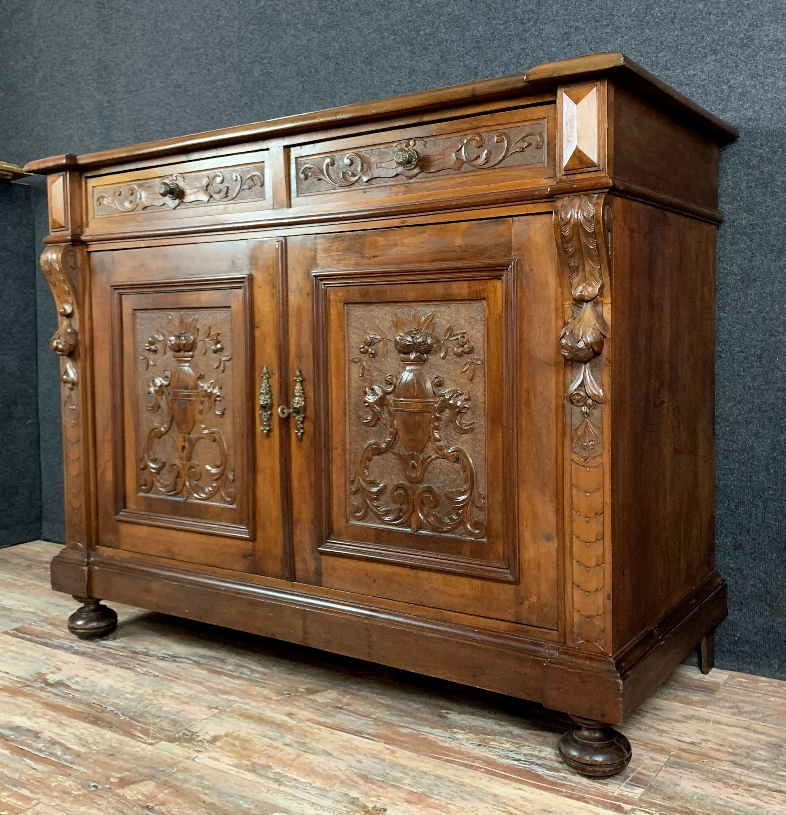 Renaissance walnut buffet has plenty sculpture decorations