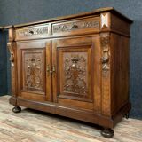 Renaissance walnut buffet has plenty sculpture decorations