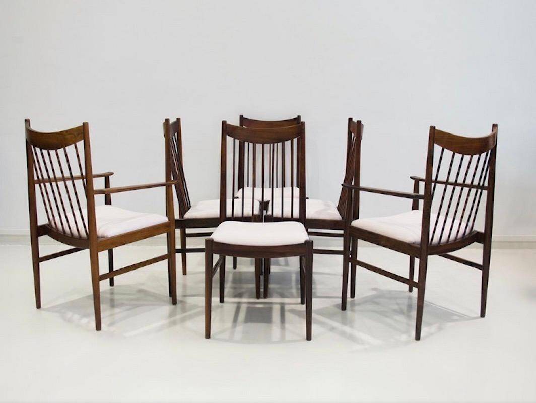 Set of six wooden dining chairs Arne Vodder Model No 422 with fabric upholstery.