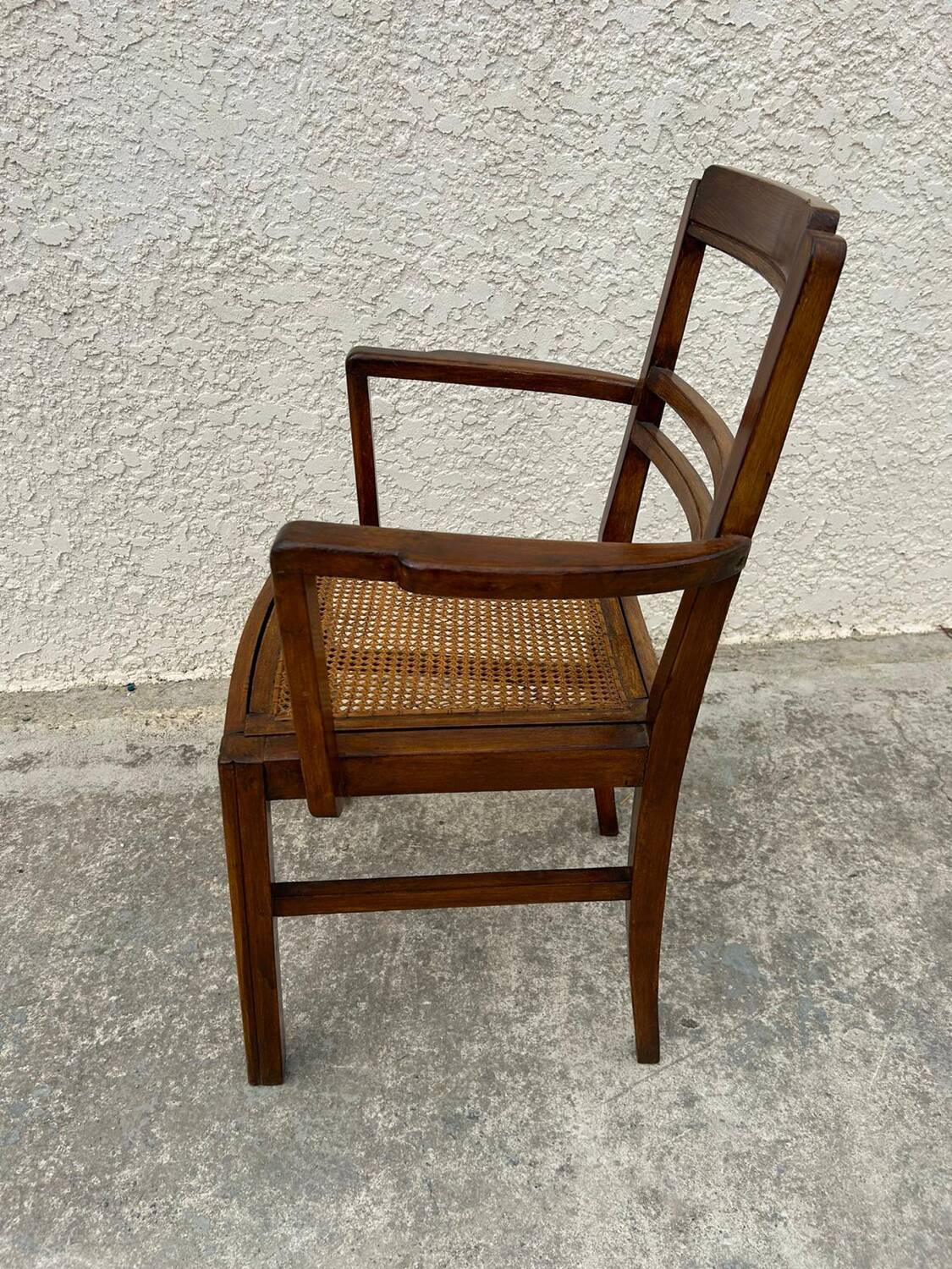 Cane armchair with armrests