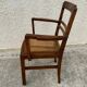 Cane armchair with armrests