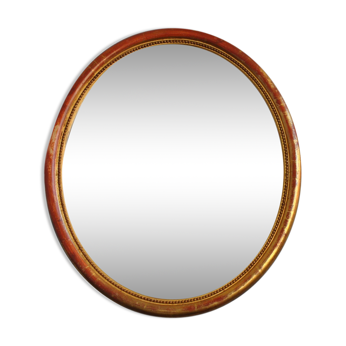 Golden stucco oval mirror
