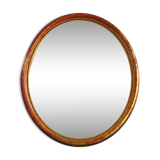 Golden stucco oval mirror