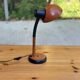 Vintage 70s desk lamp with a swan neck in terracotta and black, space age style.