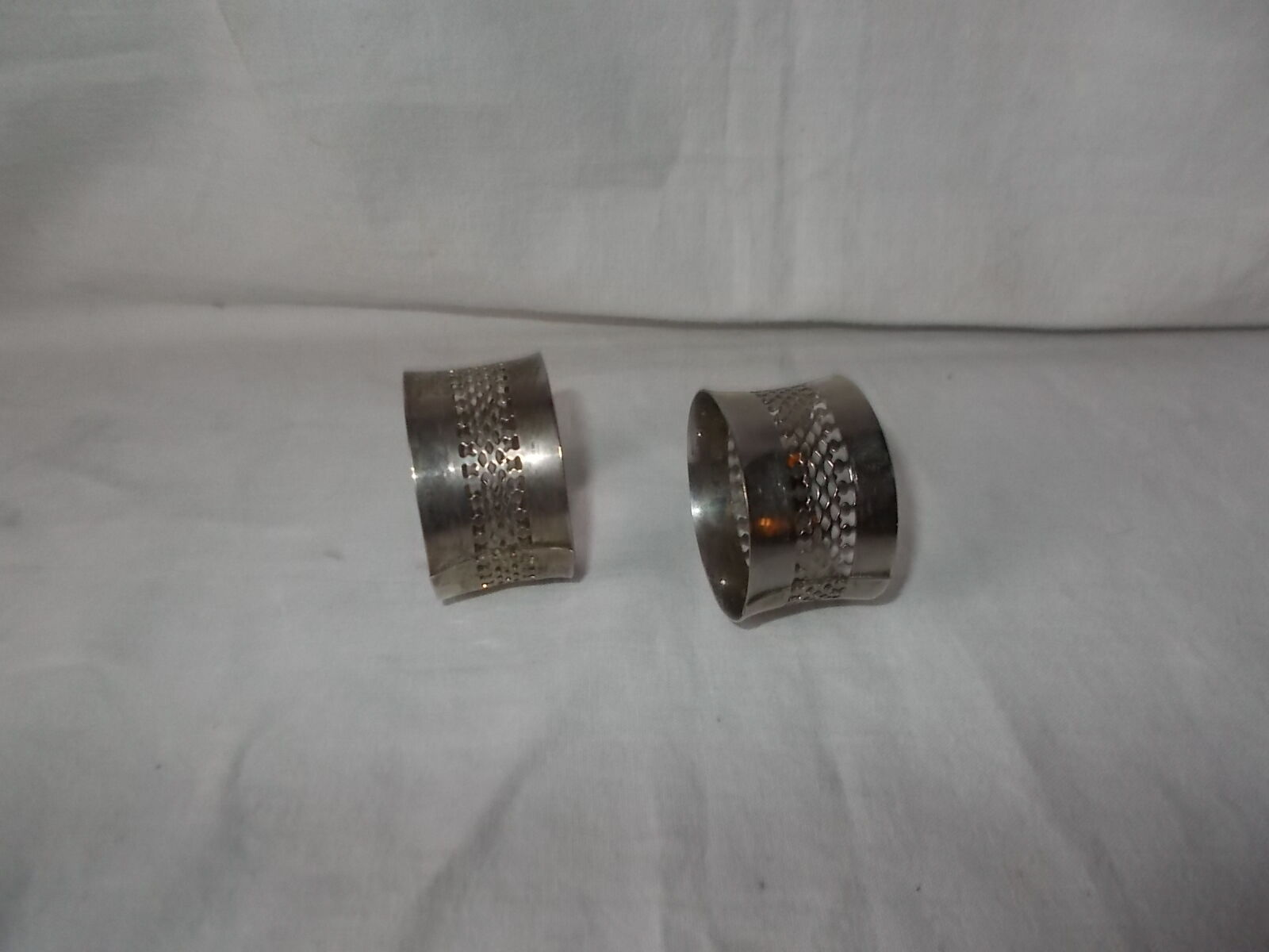 Lot of 2 rounds of silver metal towel
