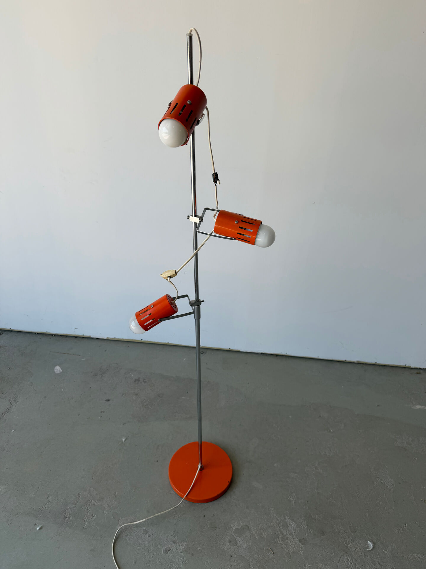 Three-spot floor lamp, Italian design, chrome and vintage orange.