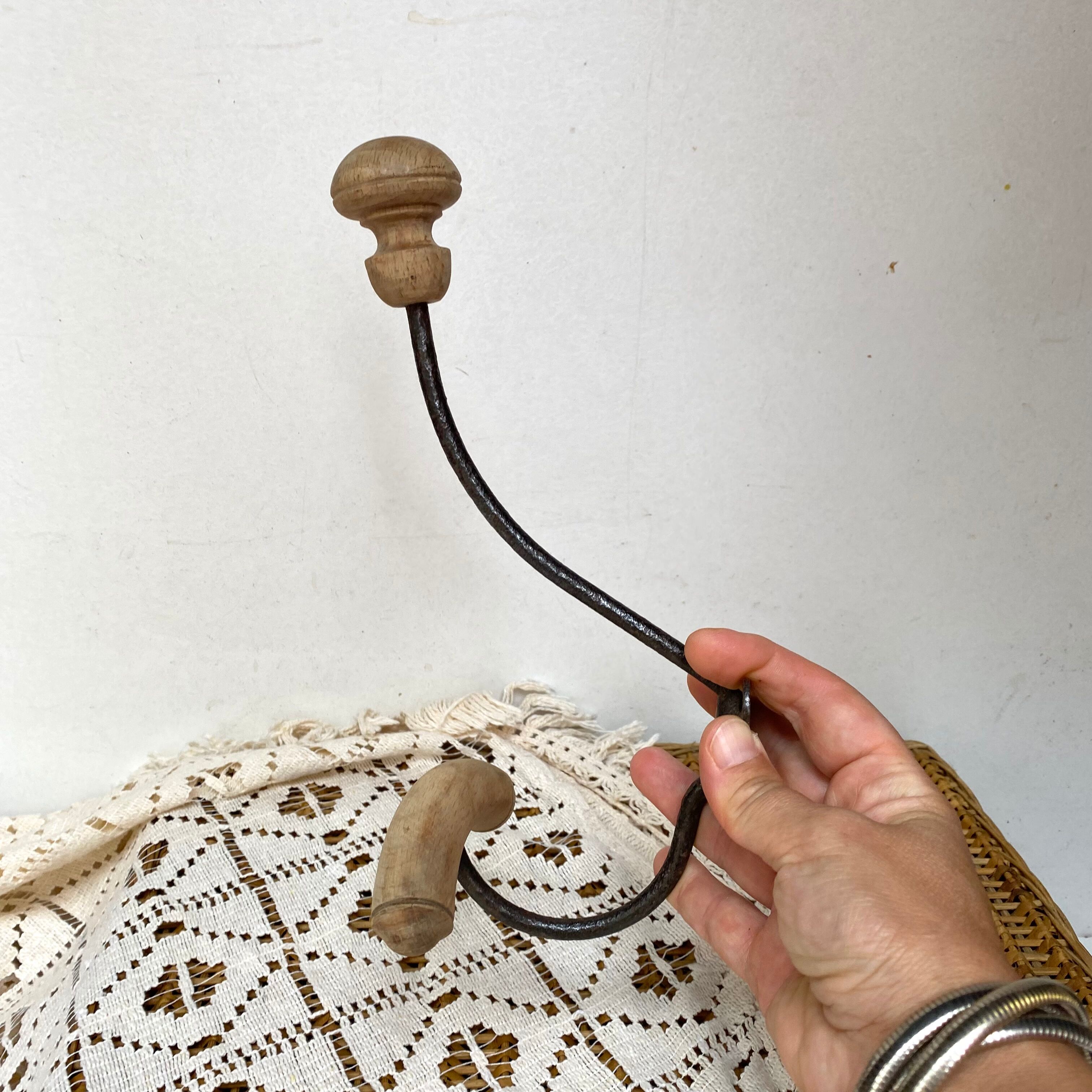 Old hook wall coat rack