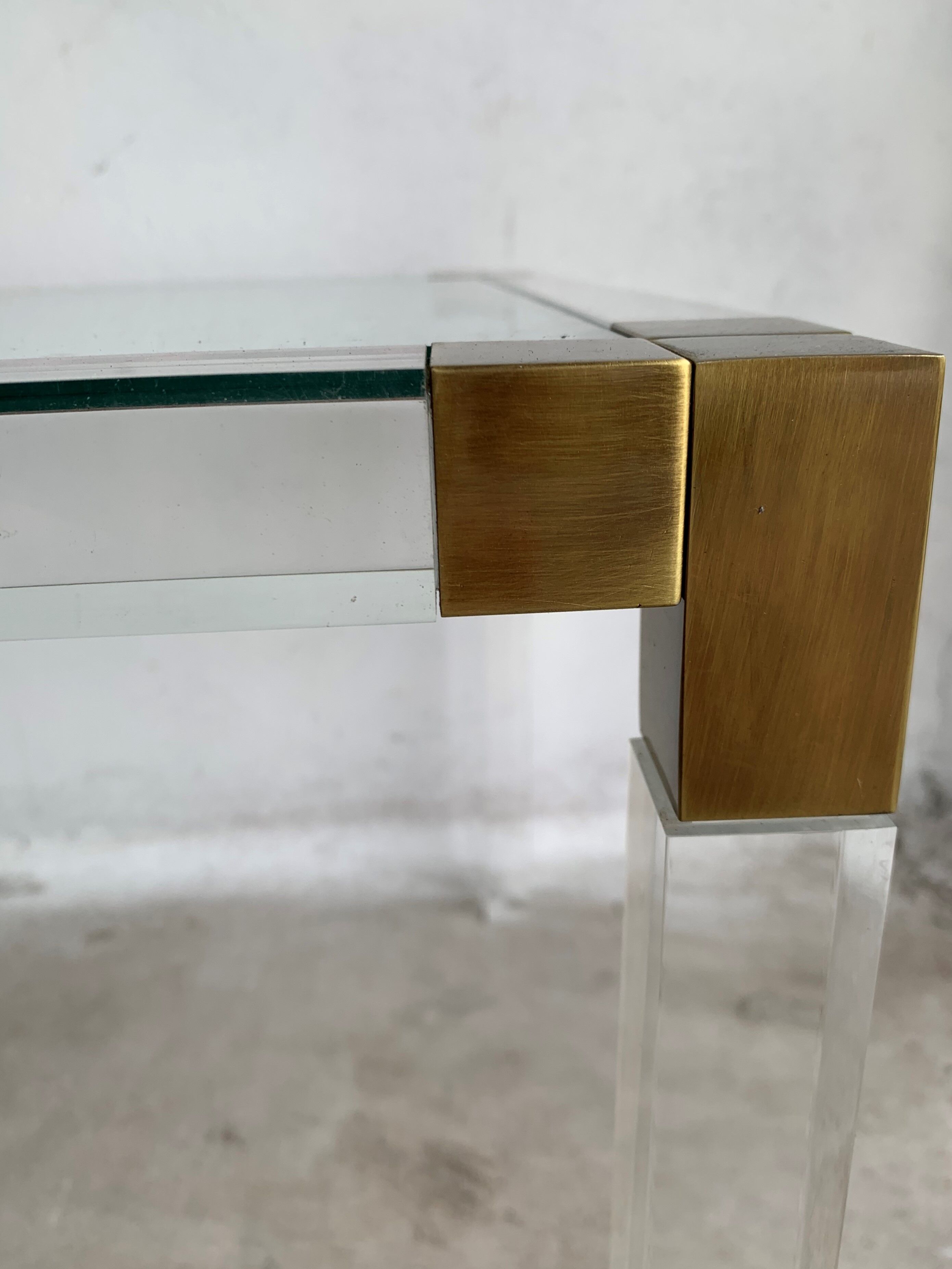 Lucite and brass coffee table by Charles Hollis Jones