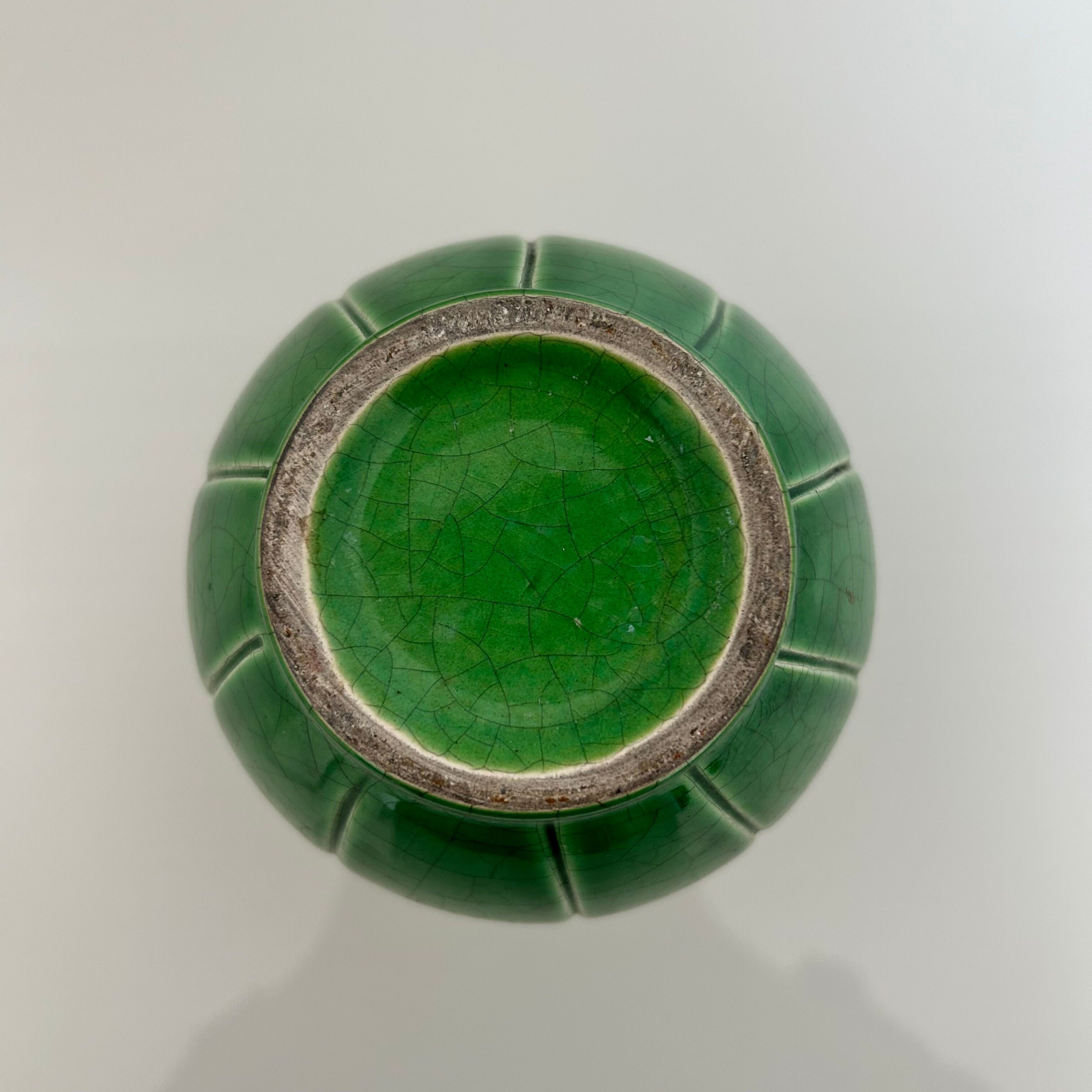 Cracked green round vase