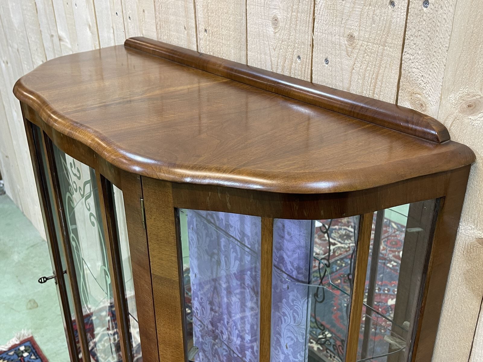 English walnut showcase from the 1930s