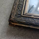 Antique wooden and gilded stucco mirror