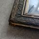Antique mirror in wood and gilded stucco