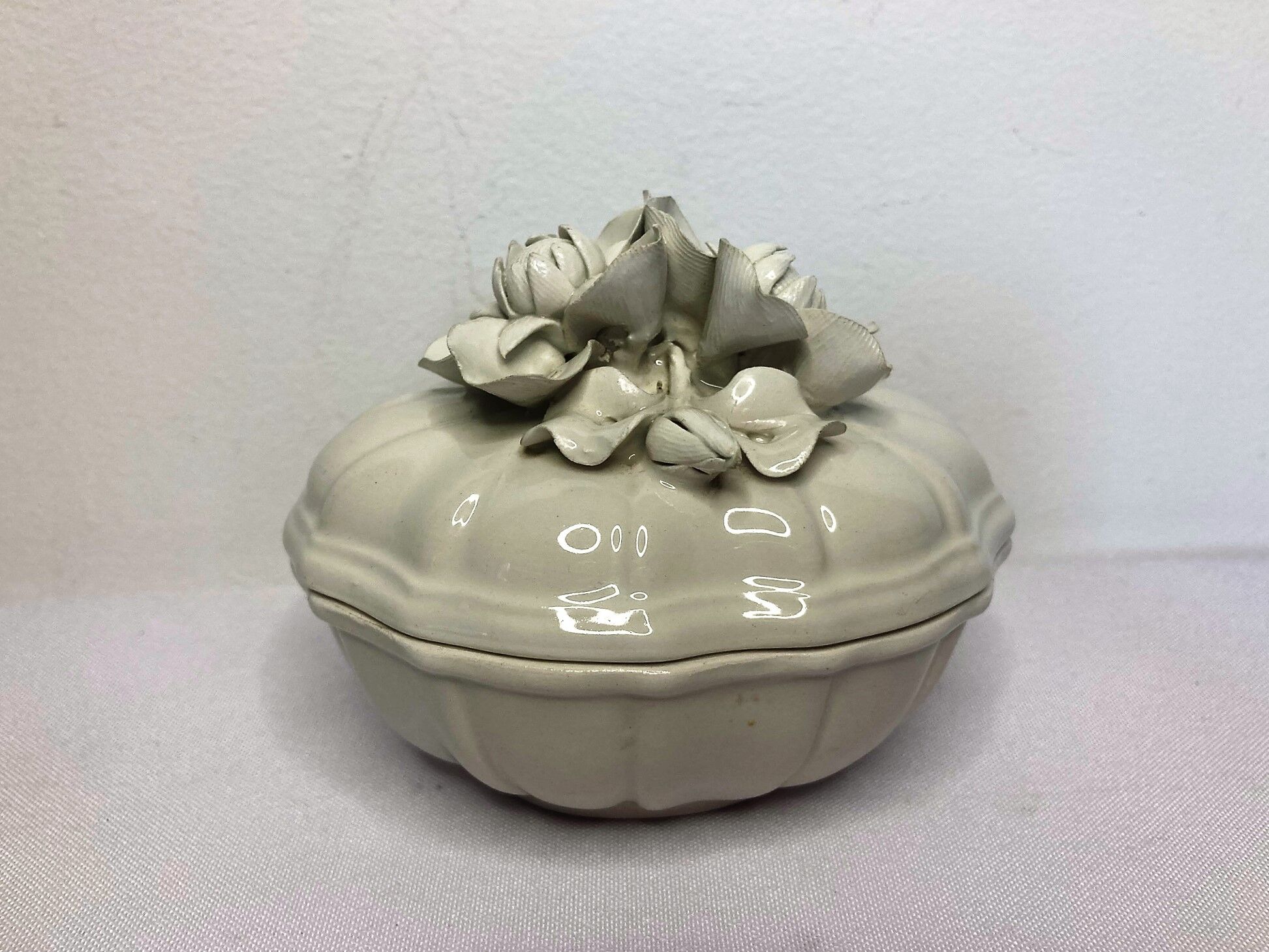 Old candy maker in white art nouveau slurry