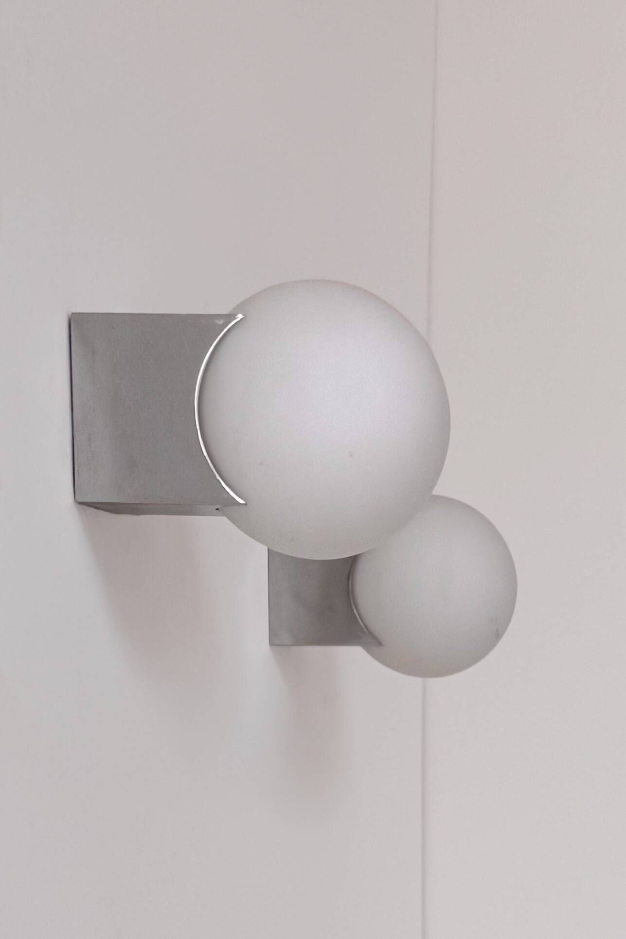 Pair of vintage wall lights in chrome and opaline, France 1990