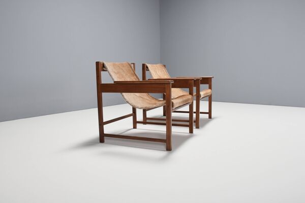 Paire de fauteuils 'Lia' de Sérgio Rodrigues, Brésil, 1962, Jacaranda et peau de vache