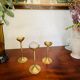 Suite of 3 vintage brass candle holders