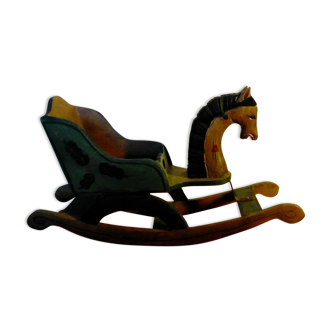 Wooden rocking horse in wood