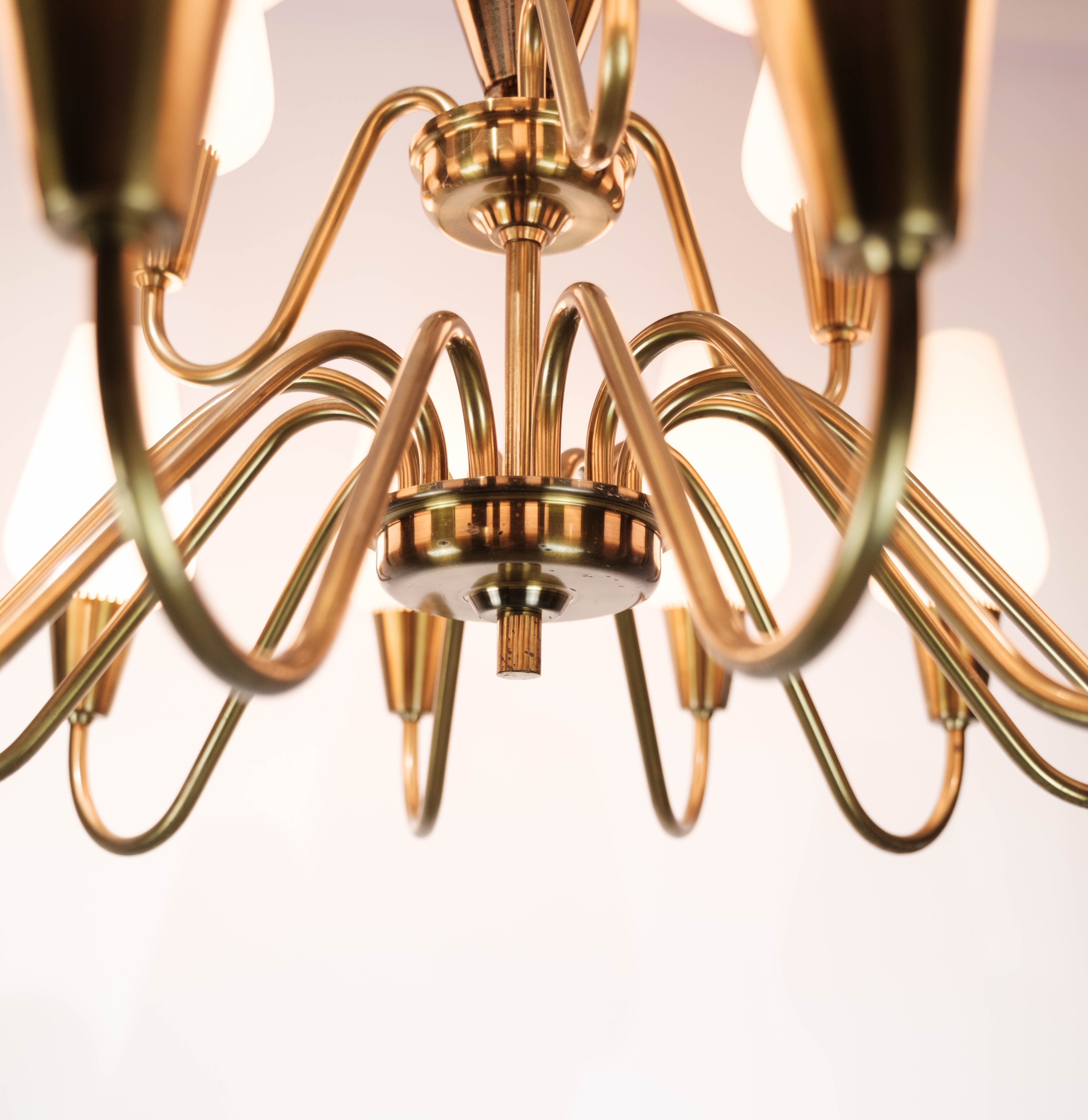 Lamp with arms of brass and glass, of Danish design from the 1950s