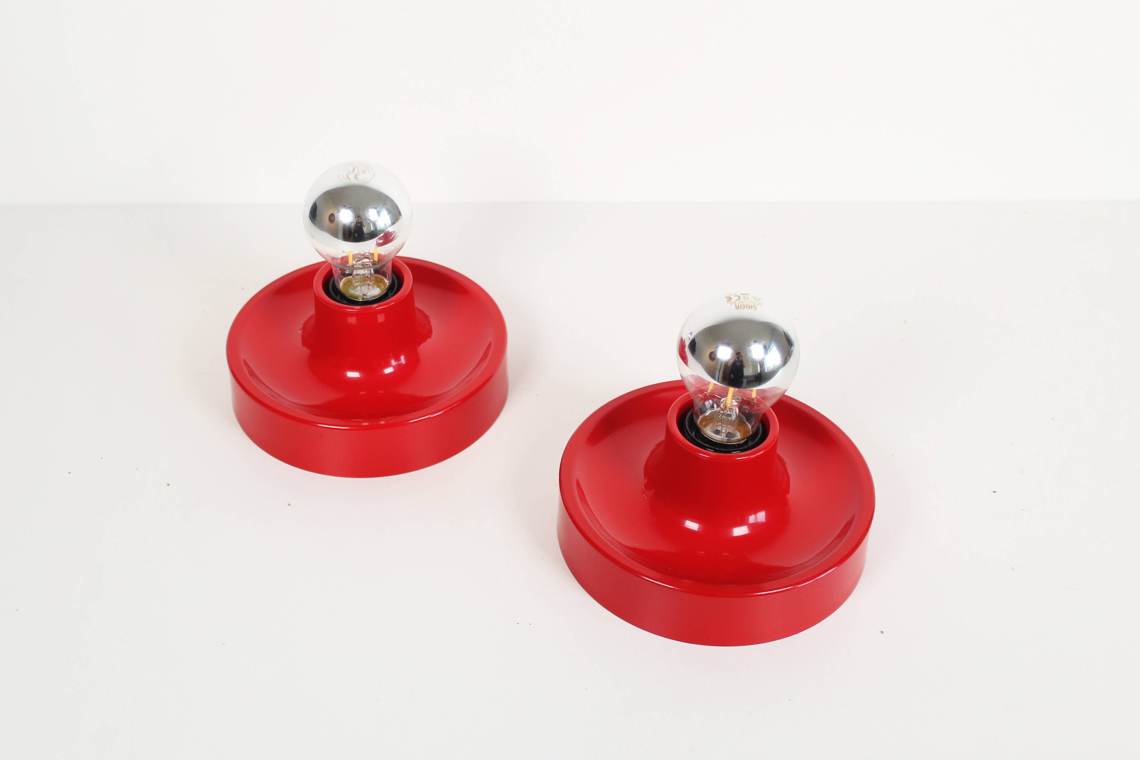 Pair of petite Disc sconces selected by Charlotte Perriand for Les Arcs