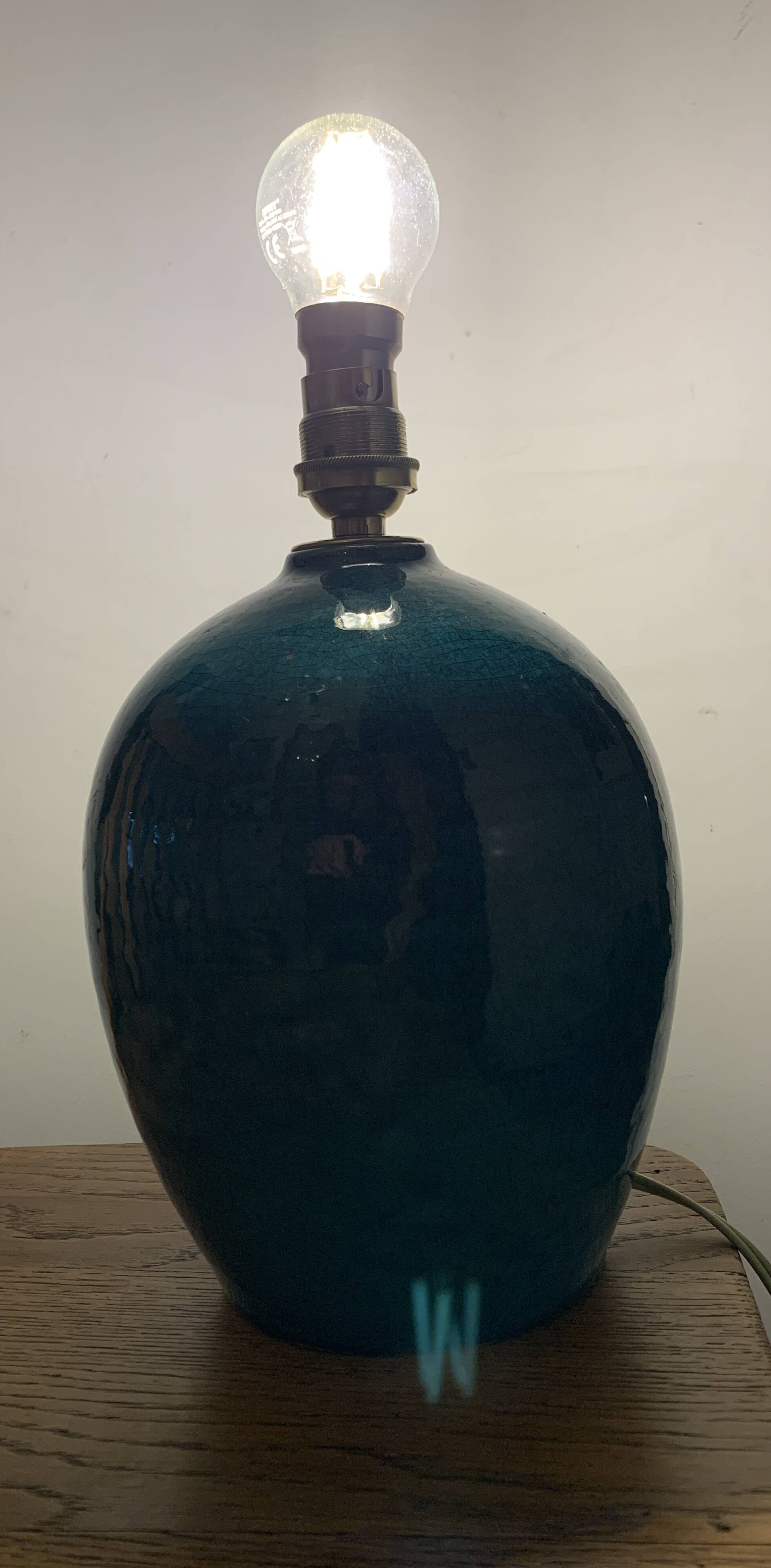 Cracked and signed ceramic ball lamp base, blue-green tones