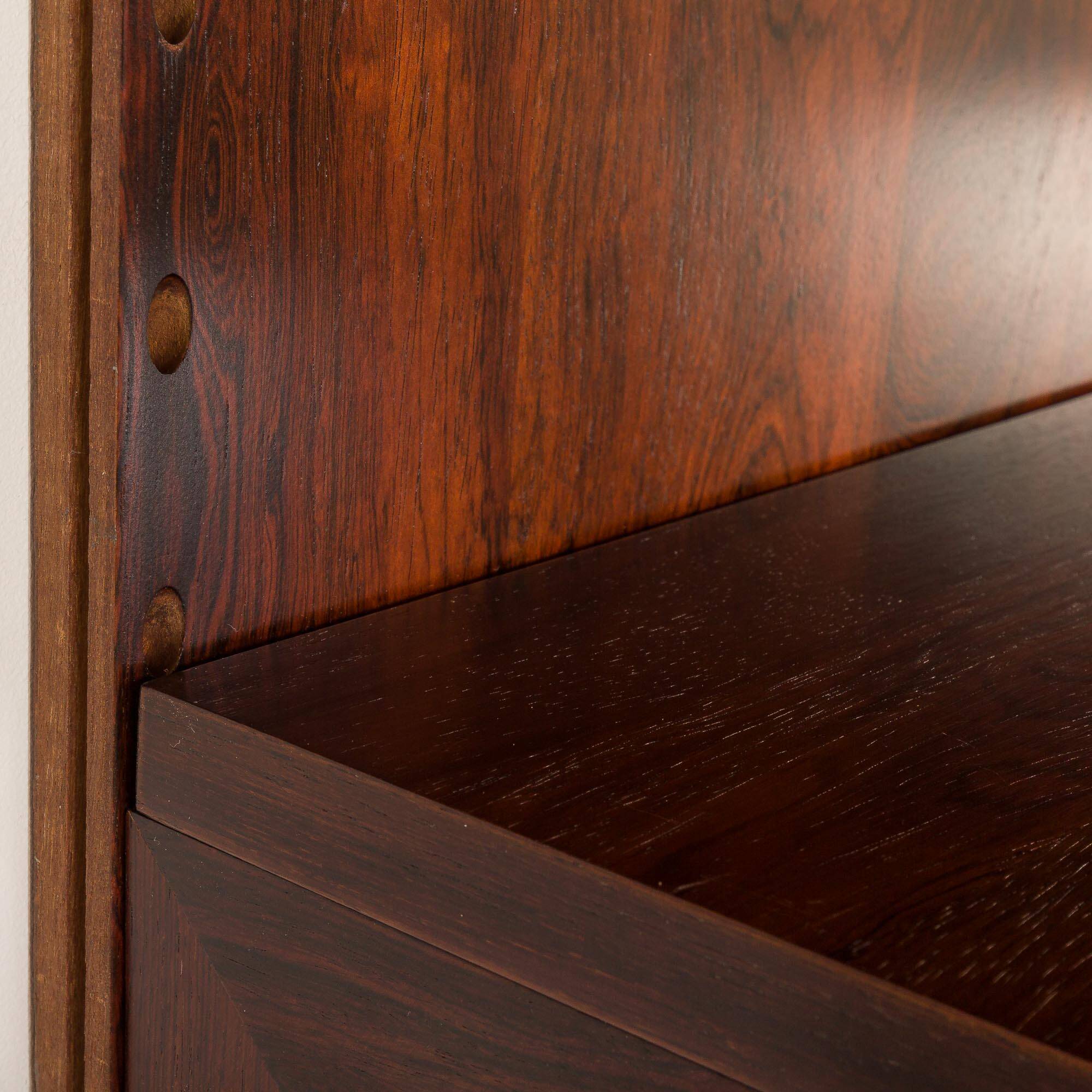 Poul Cadovius rosewood wall unit on panels for Cado, Denmark 1960s