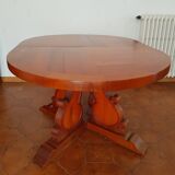 Oval extendable dining table in solid cherry wood