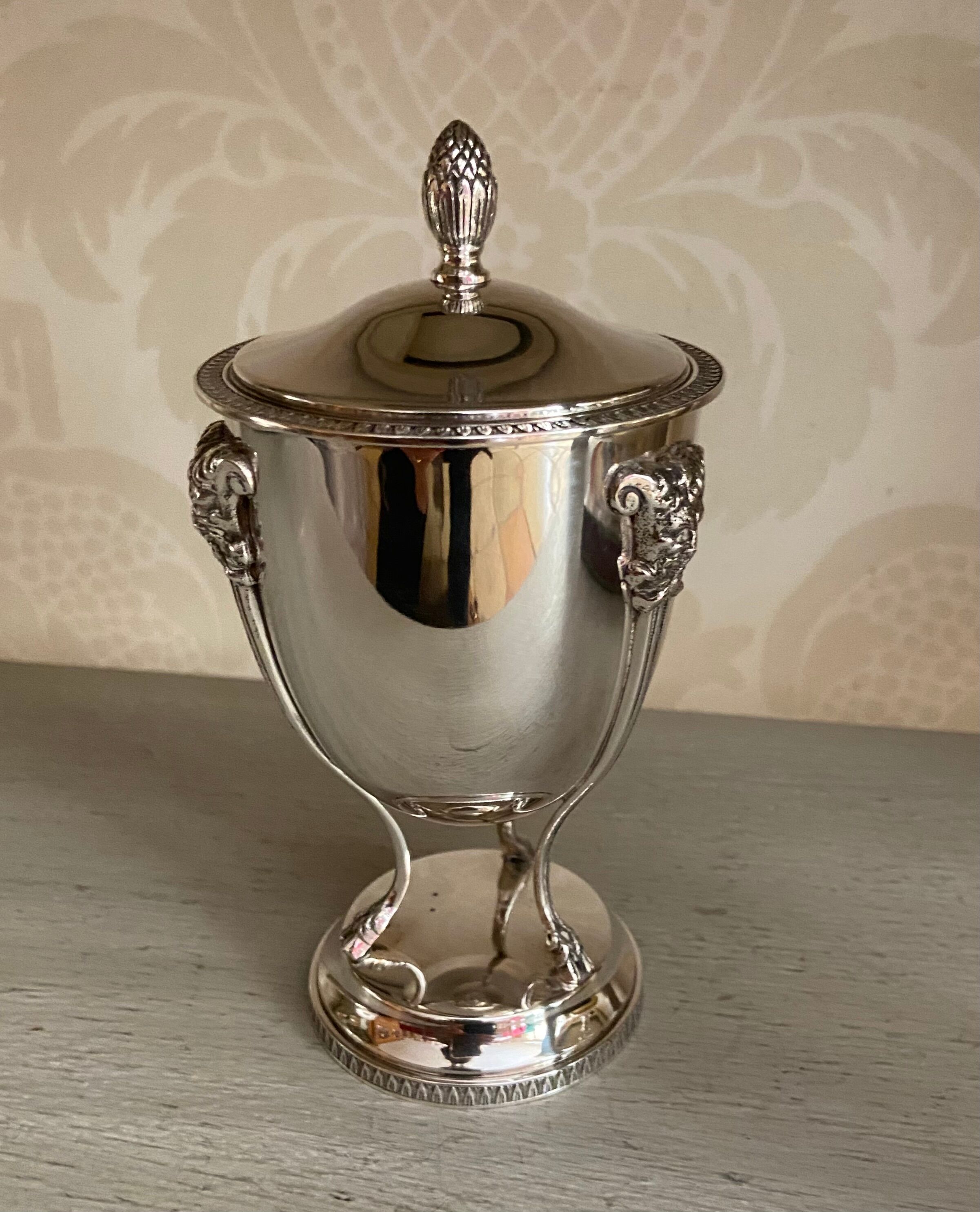 Silver metal sugar bowl on claws