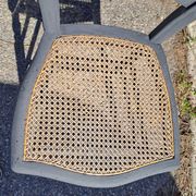 Pair of 2 chairs with cane seats in black wood, circa 1940