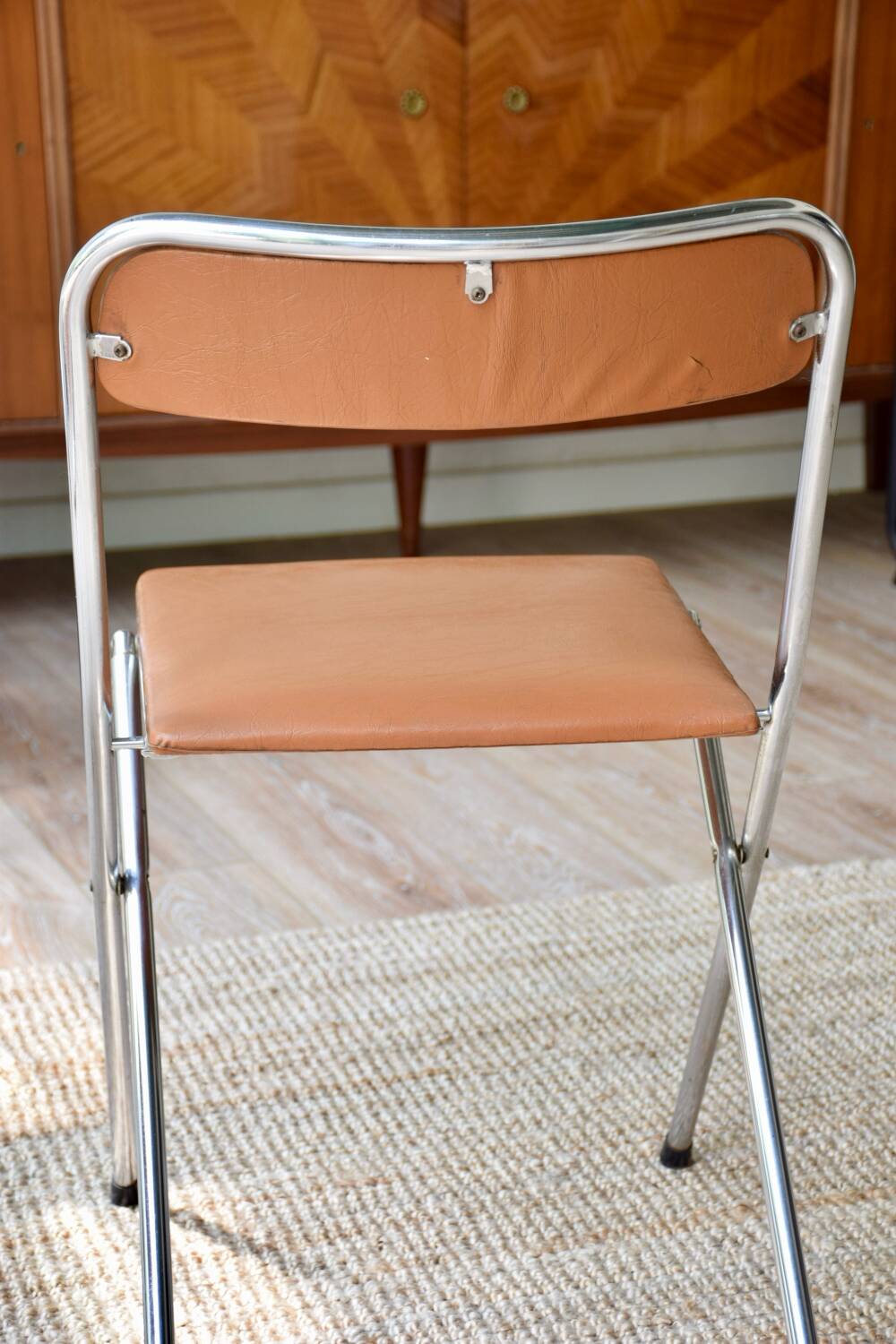Pair of “Soudexvinyl” folding chairs in skai and chrome tube