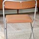 Pair of “Soudexvinyl” folding chairs in skai and chrome tube