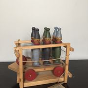 Set of Moulin Roty brand wooden bowling on roller cart, limited series.
