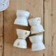4 mismatched vintage diabolo egg cups in earthenware