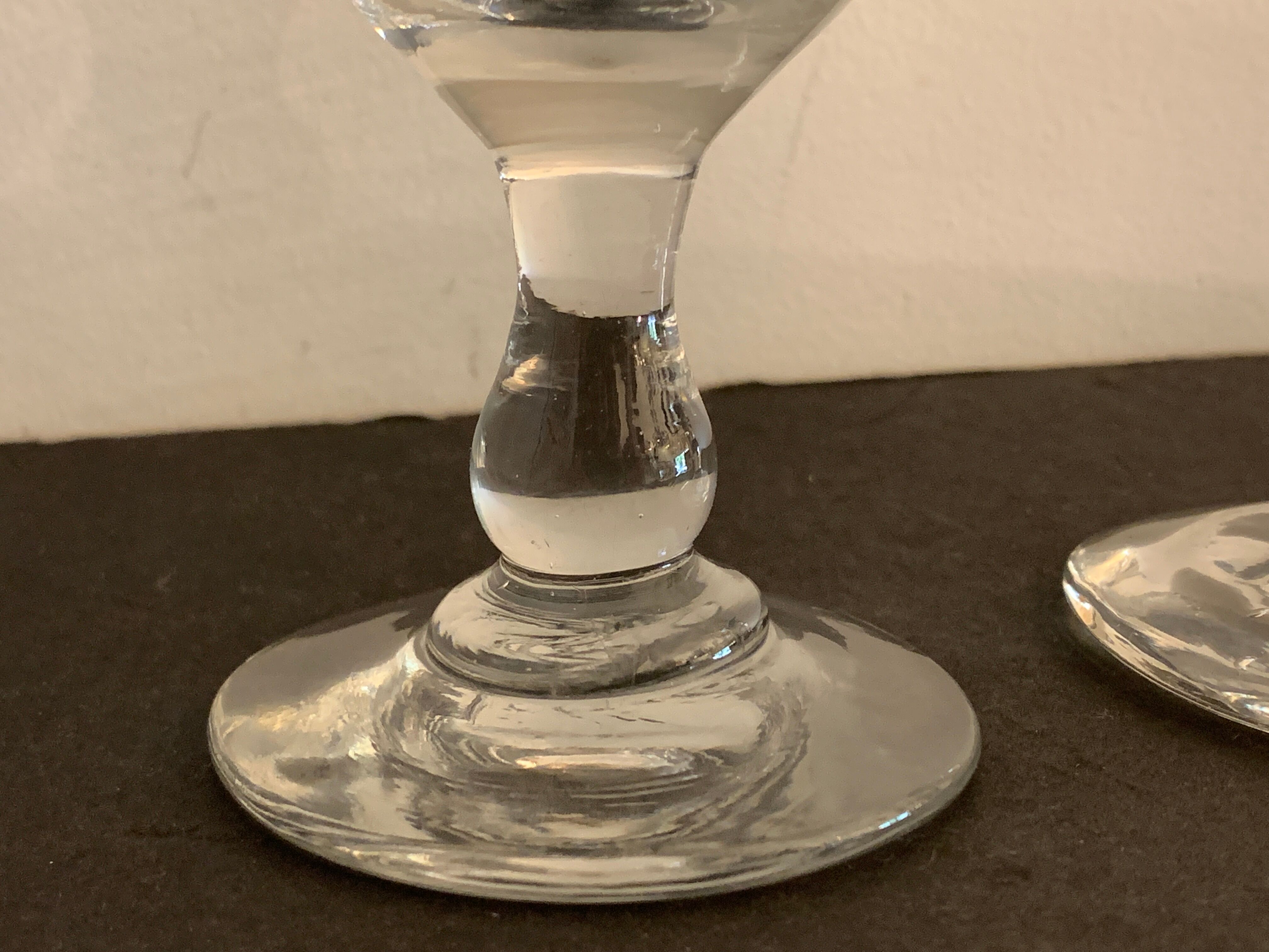 7 antique blown foot glasses