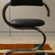 Cobra chairs in steel and black leather by Giotto Stoppino, 1970s, set of 5.