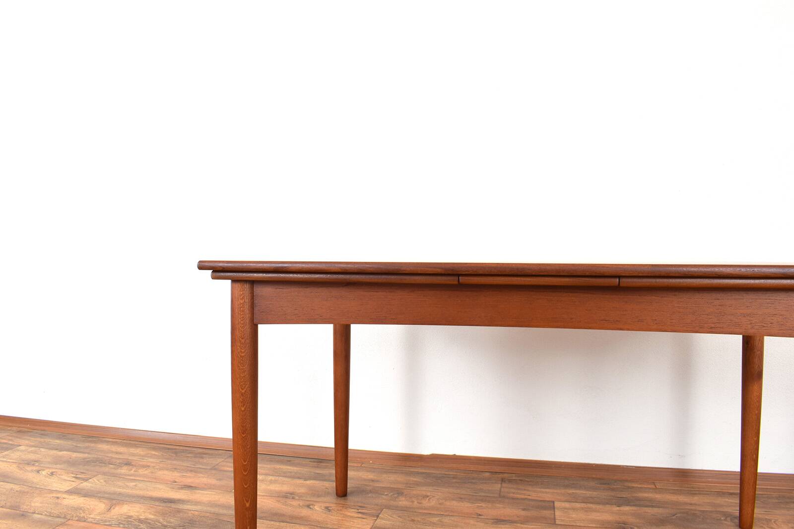 Mid-century Danish teak extendable dining table, 1960s.