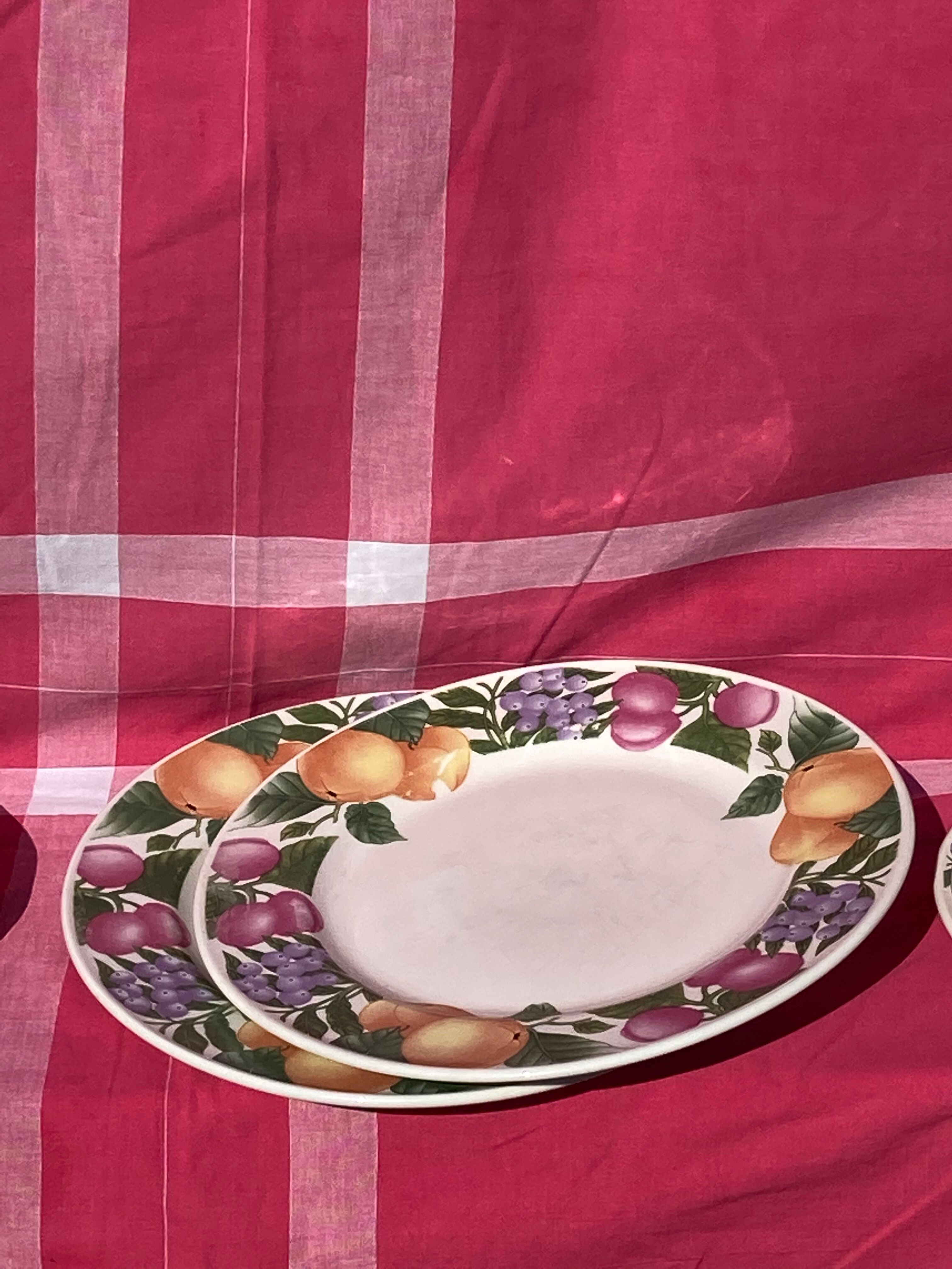 Old plates with fruit decoration